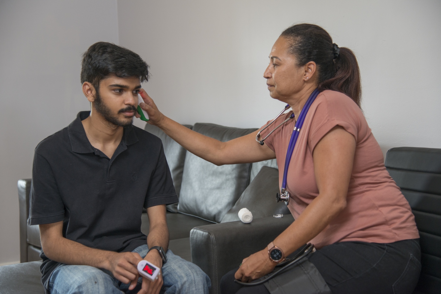 NDIS Support Worker Checking Client's Vital Signs