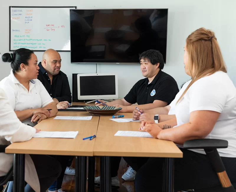 Healthcare Request Team in a Staff Meeting